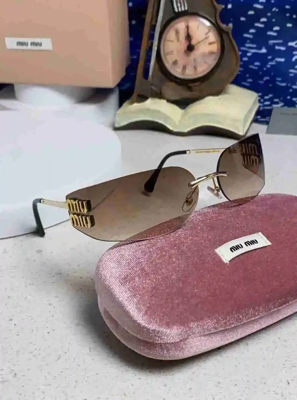 Miu Miu Rimless Gradient Brown Lens Gold Logo Sunglasses